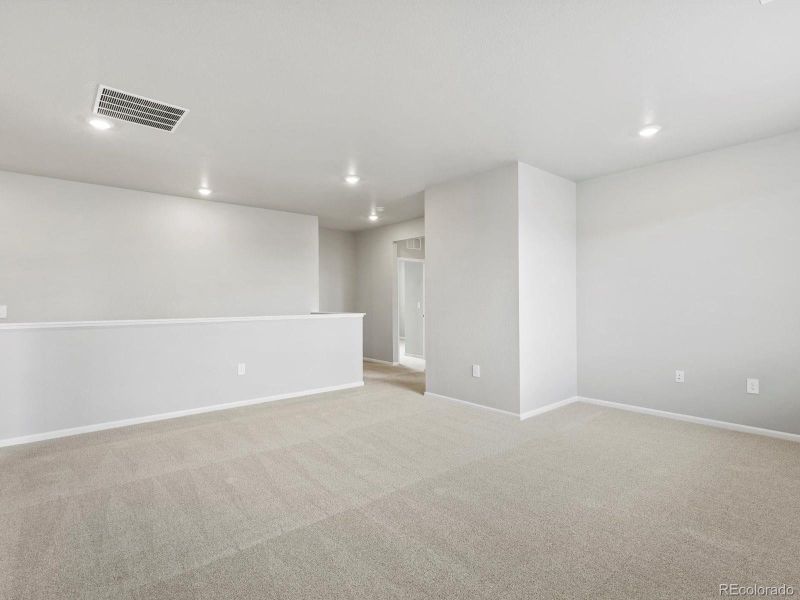 Spacious, unfurnished interior of a new home in Poudre Heights: The Alpine Collection, Windsor (Image 16).