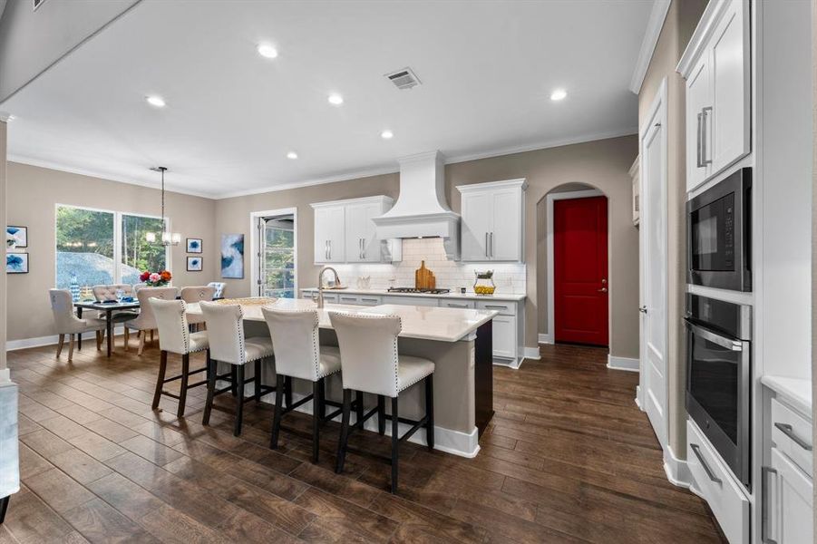 Welcome to your dream kitchen, the perfect blend of style and functionality! Whether you're a culinary enthusiast or simply love to socialize while others cook, this space is designed for both.