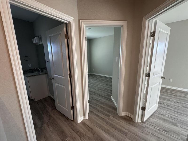 Hallway featuring hardwood / wood-style flooring