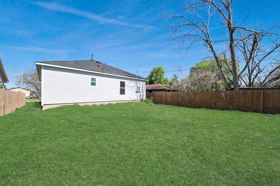Exterior details and patio area of a home in , Houston (Image 4).