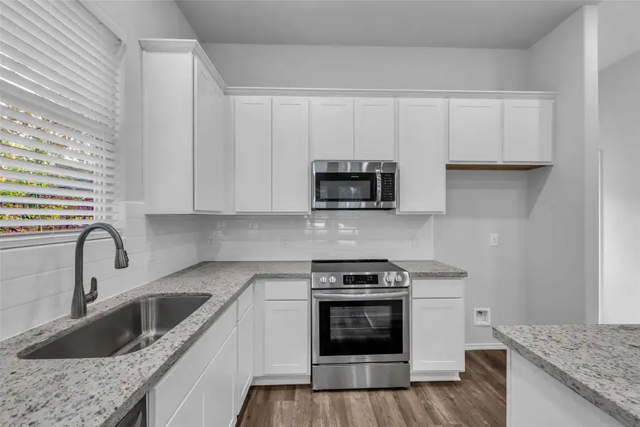 Furnished interior view inside a new home in , Willis (Image 9).