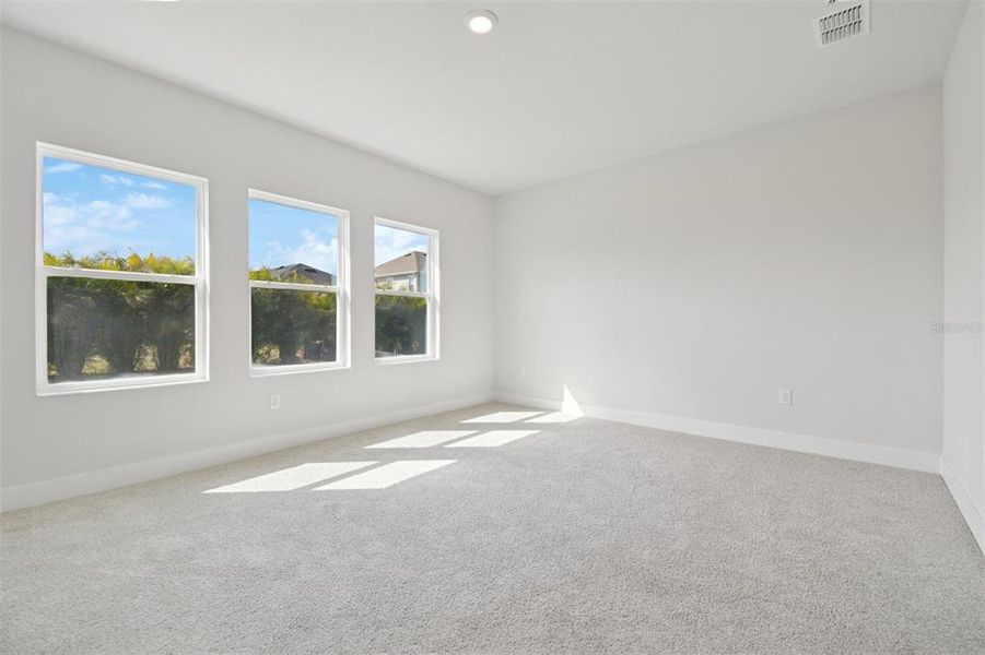 Spacious, unfurnished interior of a new home in Waterset Tradition Series, Apollo Beach (Image 32).