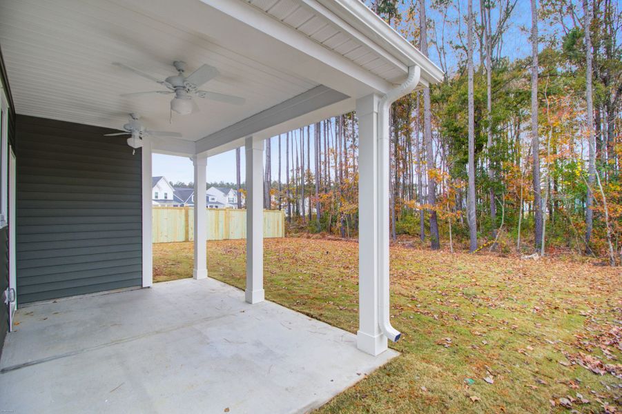 Exterior details and patio area of a home in Homecoming, Ravenel (Image 22).
