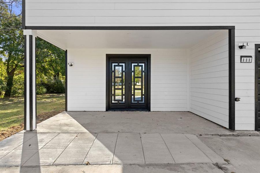 Exterior details and patio area of a home in , Pecan Gap (Image 27).
