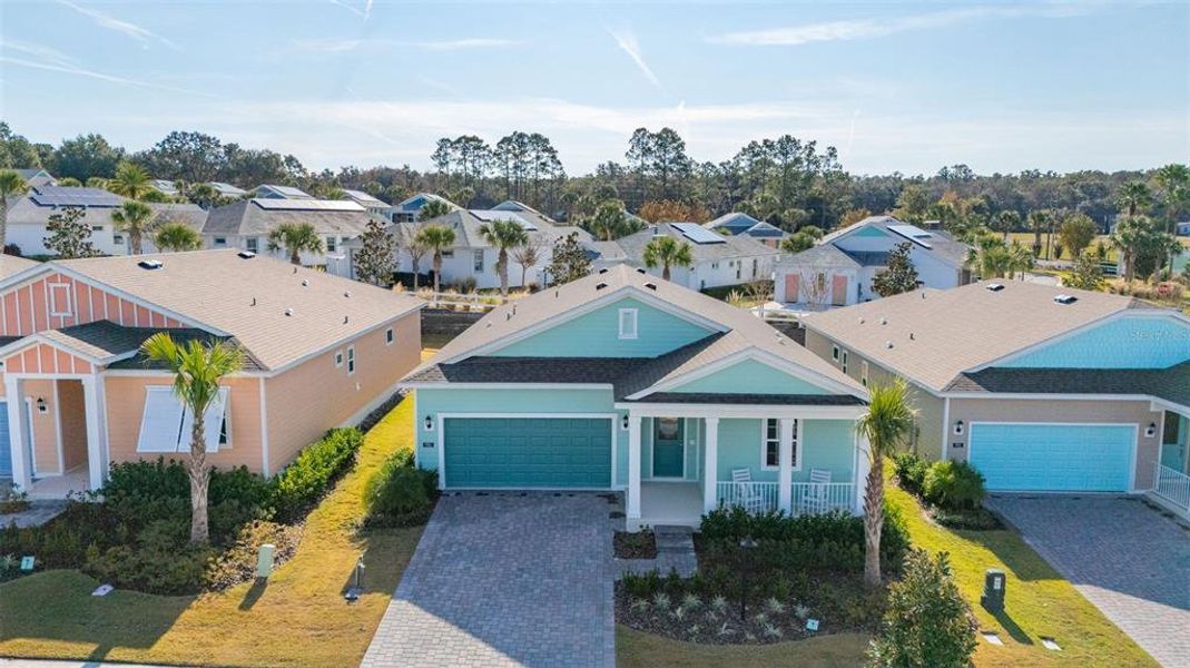 Front exterior of a new home in Green Key Village, Lady Lake, FL, highlighting curb appeal (Image 17).