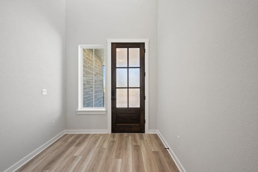 Spacious, unfurnished interior of a new home in Terrace Collection At Turner's Crossing, Buda (Image 22).