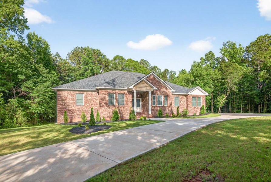 Front exterior of a new home in , Oxford, GA, highlighting curb appeal (Image 39). Front exterior of a new home in , Oxford, GA, highlighting curb appeal (Image 39).