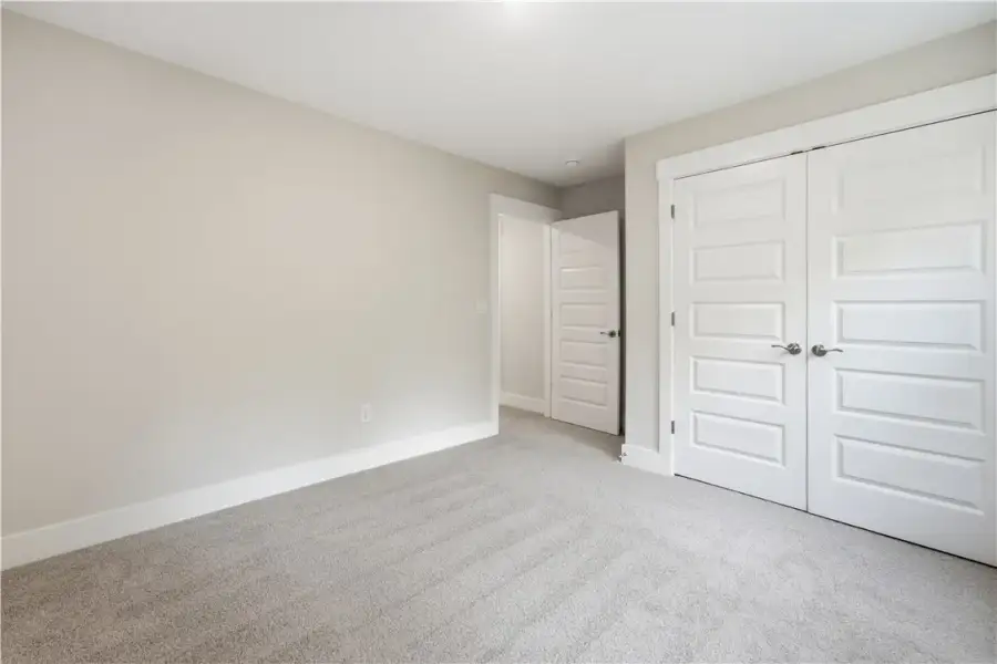 Soft carpeting pairs with classic trim in this inv