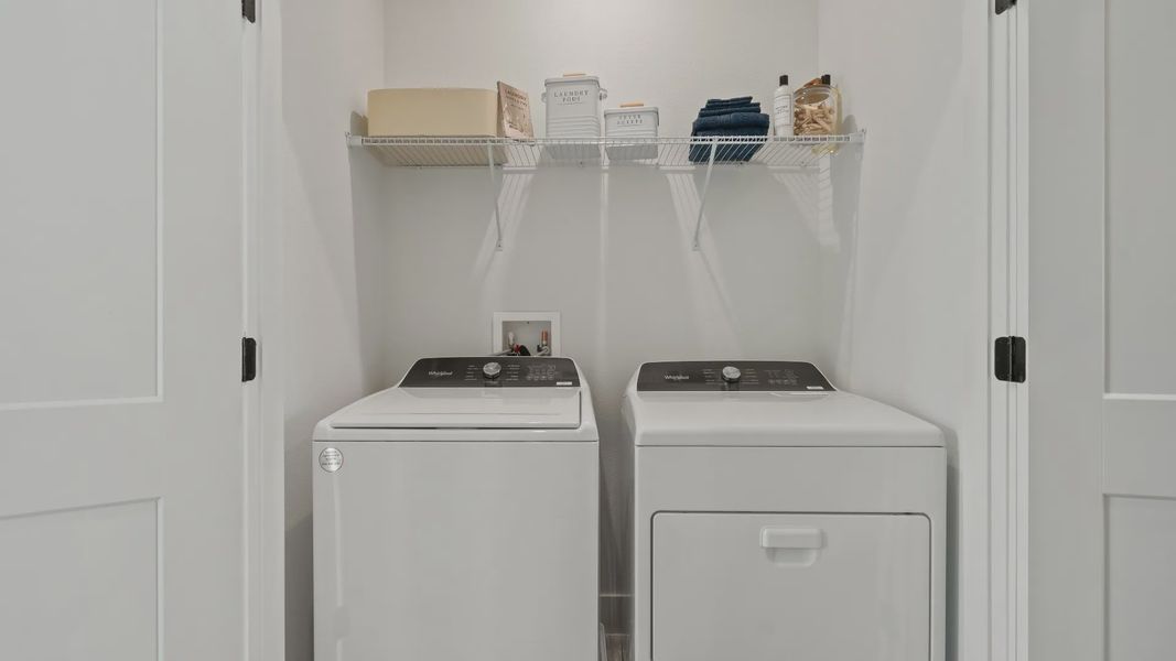 Furnished interior view inside a new home in Parkview at Hamlin, Winter Garden (Image 33).