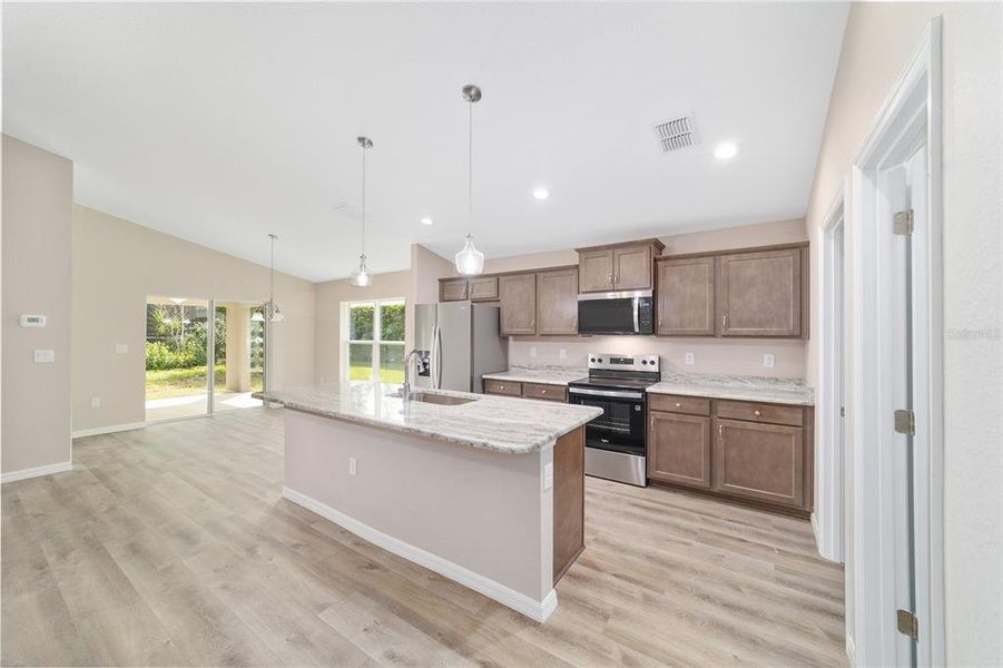 Furnished interior view inside a new home in , Dunnellon (Image 11).