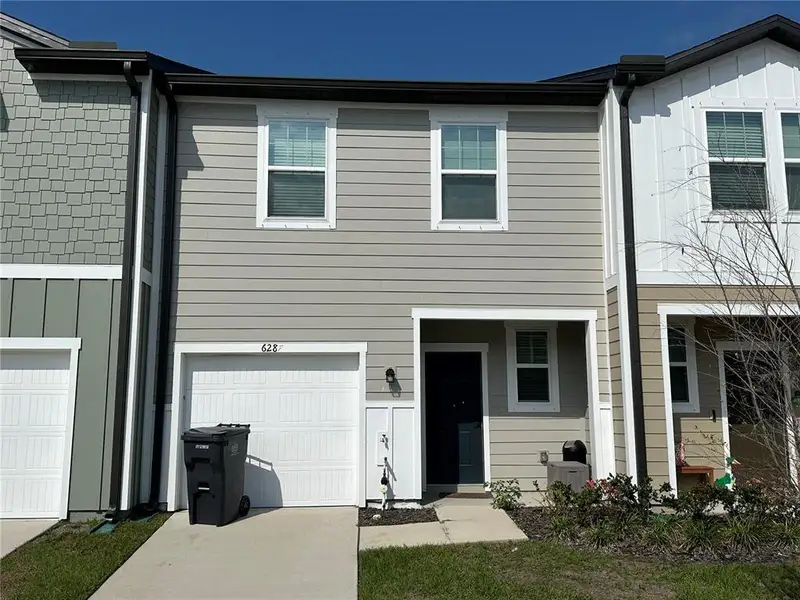 Front exterior of a new home in , Gibsonton, FL, highlighting curb appeal (Image 1). Front exterior of a new home in , Gibsonton, FL, highlighting curb appeal (Image 1).