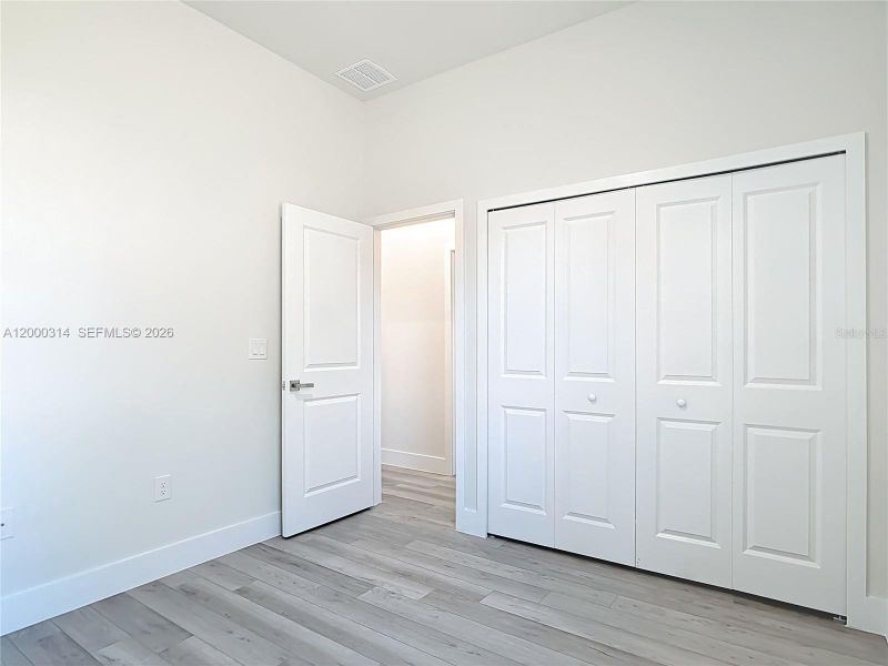 Spacious, unfurnished interior of a new home in , Port Charlotte (Image 27).