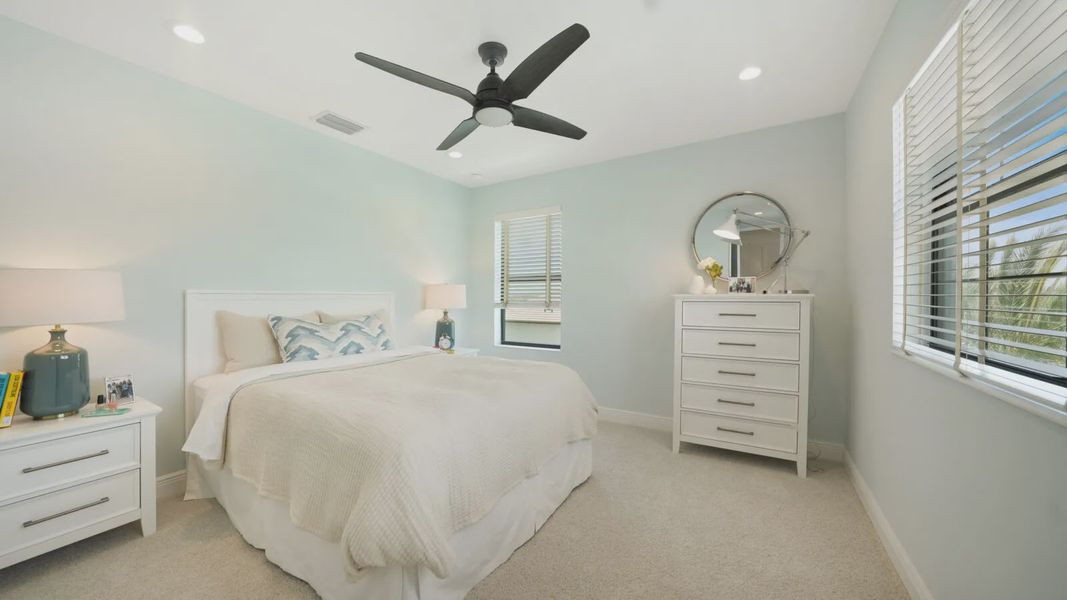 Representative furnished interior of a home built from the Artistry by Neal Communities in SkySail, Naples (Image 13).