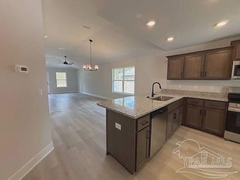 Furnished interior view inside a new home in Turtle Creek, Cantonment (Image 3).