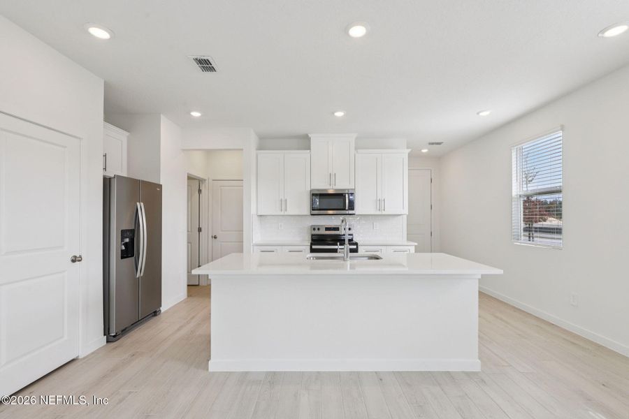 Furnished interior view inside a new home in Parkside at Shearwater, St. Augustine (Image 12).