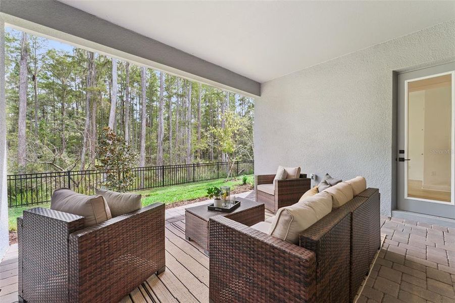 Exterior details and patio area of a home in Palms at Windermere, Windermere (Image 34).