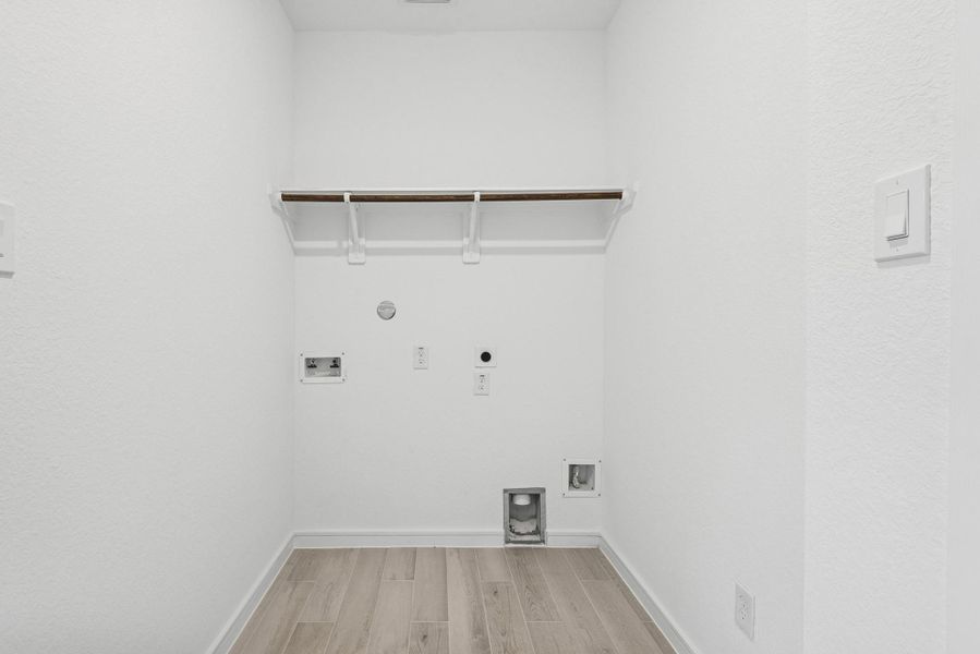 Laundry room (*Photo not of actual home and used for illustration purposes only.)