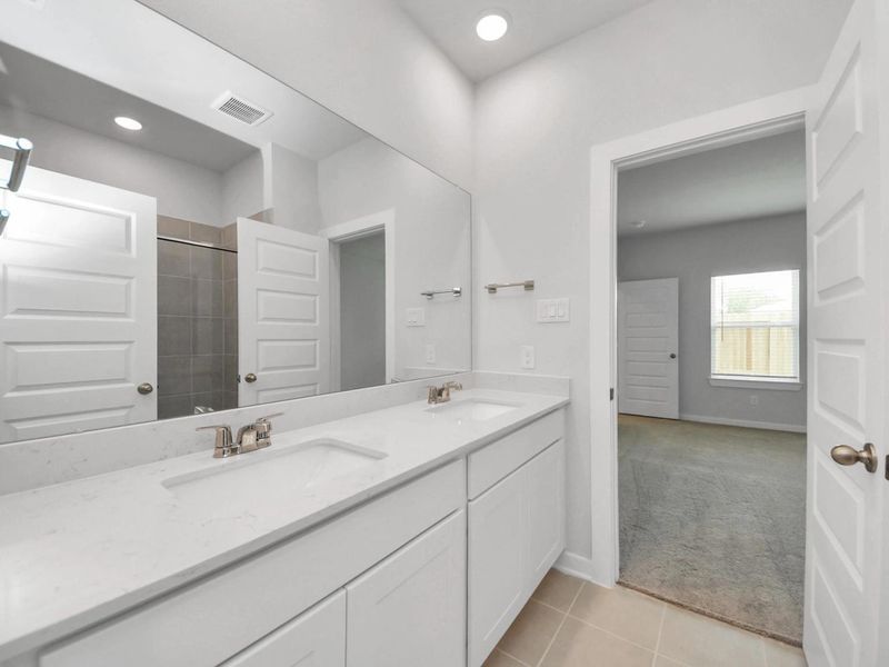 Furnished interior view inside a new home in Caney Creek Place, Conroe (Image 16).