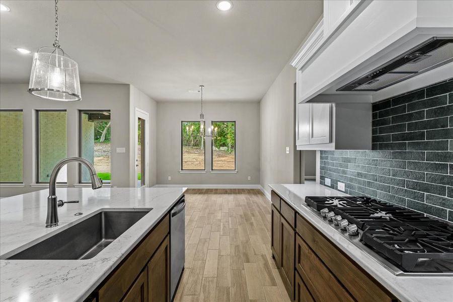 Doug Parr Homes | Hunter Plan - Kitchen and Breakfast Nook Doug Parr Homes | Hunter Plan - Kitchen and Breakfast Nook