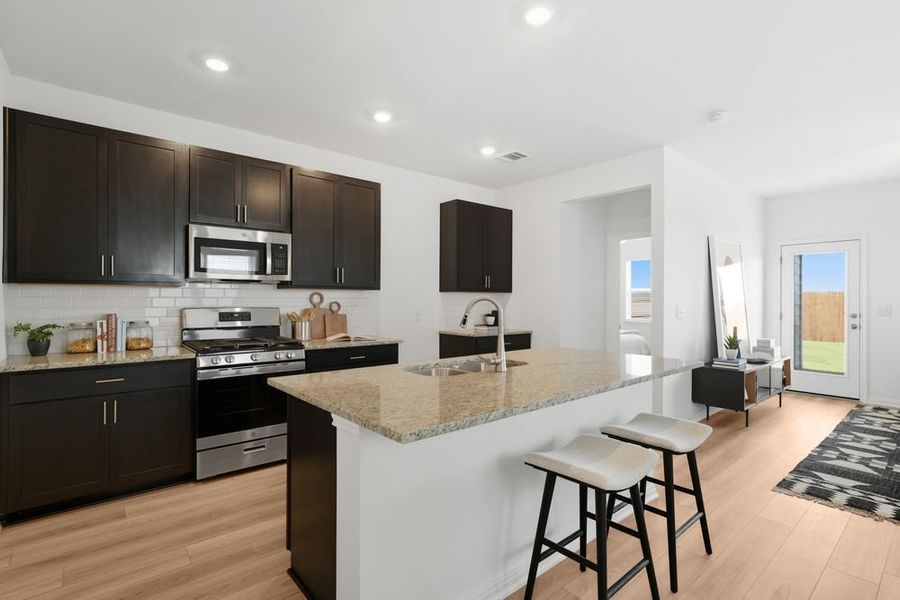 Furnished interior view inside a new home in Longview 40s, Del Valle (Image 4).