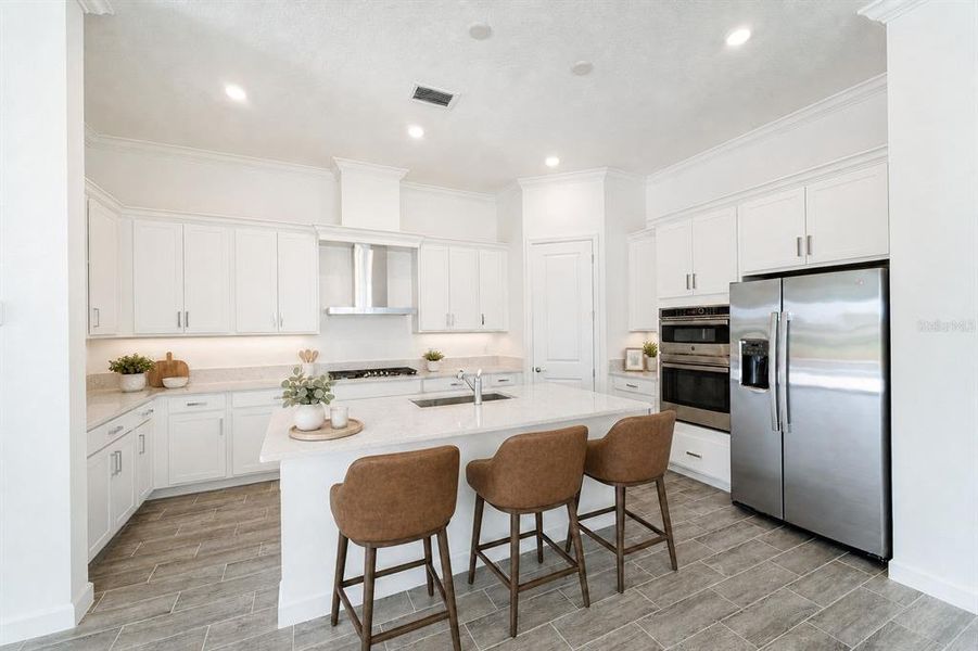 Furnished interior view inside a new home in Tesoro Club, Port St. Lucie (Image 9).