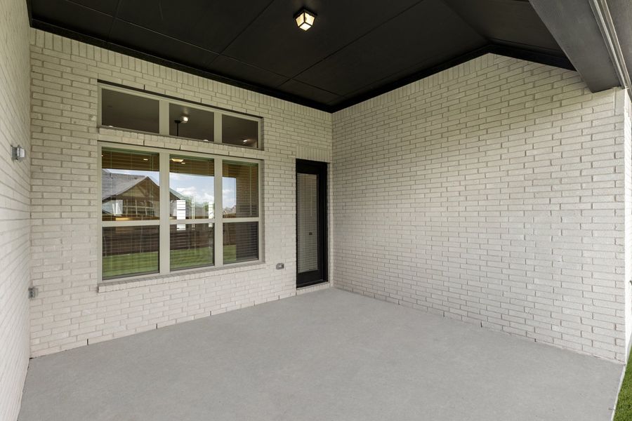Exterior details and patio area of a home in Providence Cove, McKinney (Image 3).
