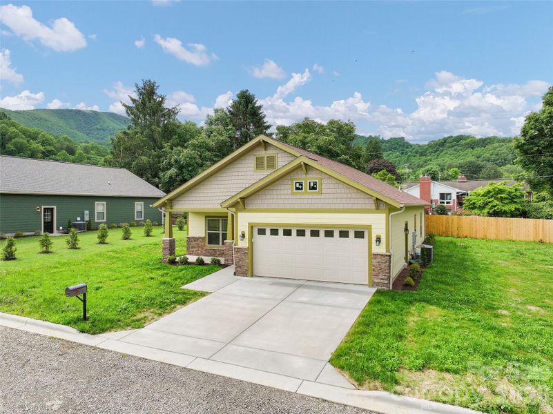 Front exterior of a new home in , Waynesville, NC, highlighting curb appeal (Image 18).