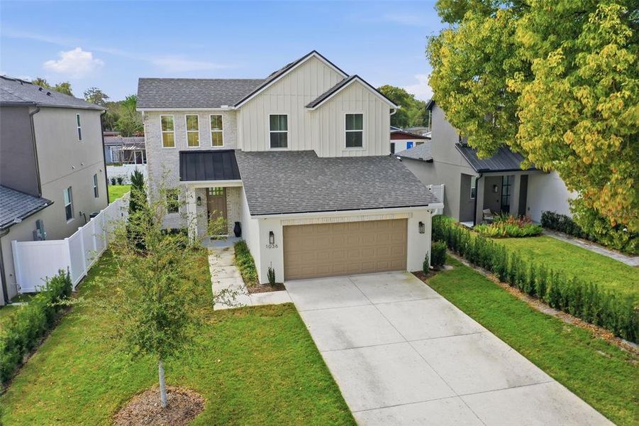 Front exterior of a new home in , Orlando, FL, highlighting curb appeal (Image 28). Front exterior of a new home in , Orlando, FL, highlighting curb appeal (Image 28).