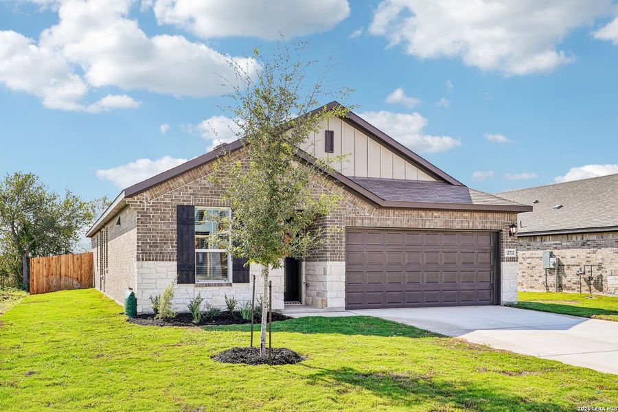 Front exterior of a new home in Carmel Ranch, Schertz, TX, highlighting curb appeal (Image 24).