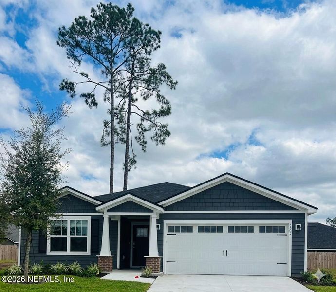 Front exterior of a new home in , Fort Myers, FL, highlighting curb appeal (Image 1). Front exterior of a new home in , Fort Myers, FL, highlighting curb appeal (Image 1).