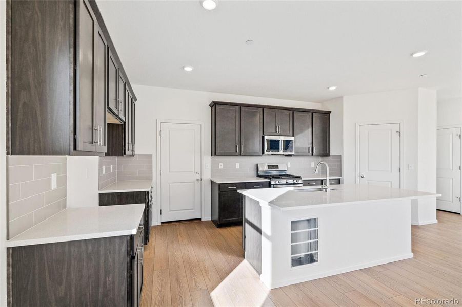 Furnished interior view inside a new home in Turnberry, Commerce City (Image 15).