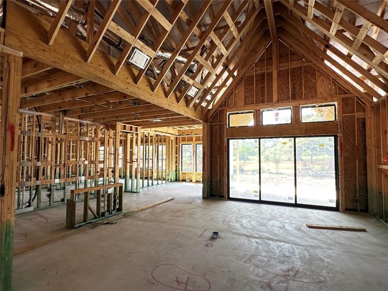 Misc room featuring high vaulted ceiling Misc room featuring high vaulted ceiling