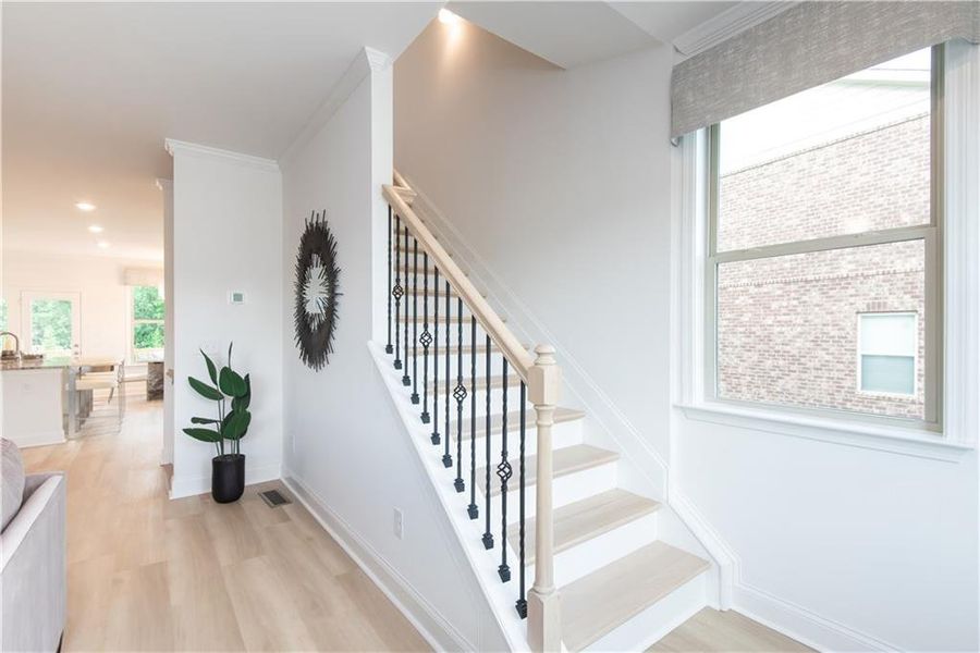 Furnished interior view inside a new home in Towns at Enclave, Lawrenceville (Image 12). Furnished interior view inside a new home in Towns at Enclave, Lawrenceville (Image 12).