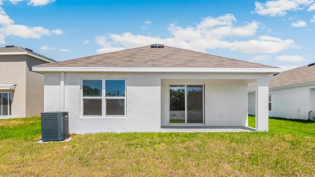 Exterior details and patio area of a home in Oakfield Trails, Parrish (Image 2). Exterior details and patio area of a home in Oakfield Trails, Parrish (Image 2).