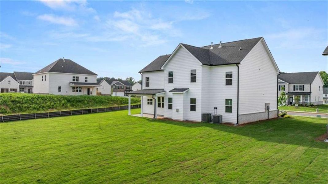 Exterior details and patio area of a home in Independence, Loganville (Image 21).