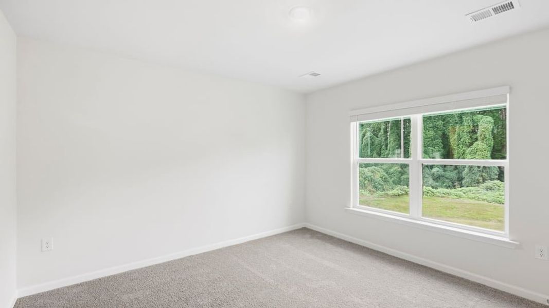 Spacious, unfurnished interior of a new home in Ravencrest, Roebuck (Image 32).