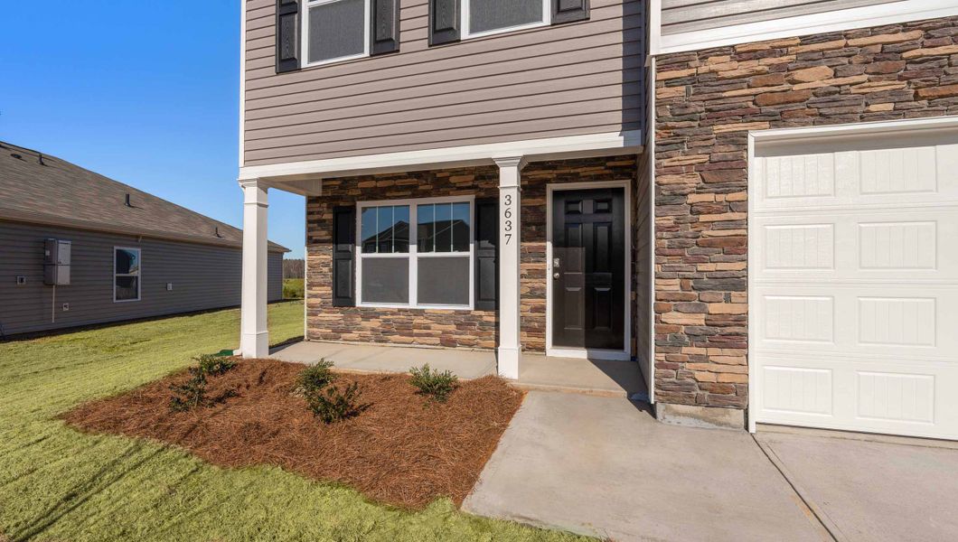 Exterior details and patio area of a home in Lightwood Cottages, Moore (Image 2). Exterior details and patio area of a home in Lightwood Cottages, Moore (Image 2).