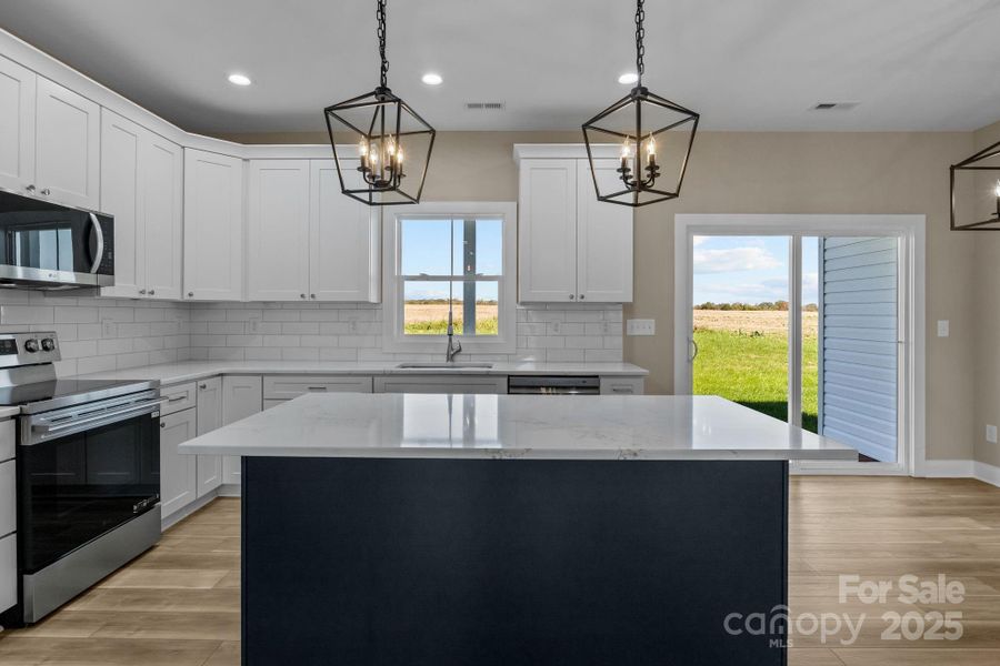 Furnished interior view inside a new home in , Olin (Image 7). Furnished interior view inside a new home in , Olin (Image 7).