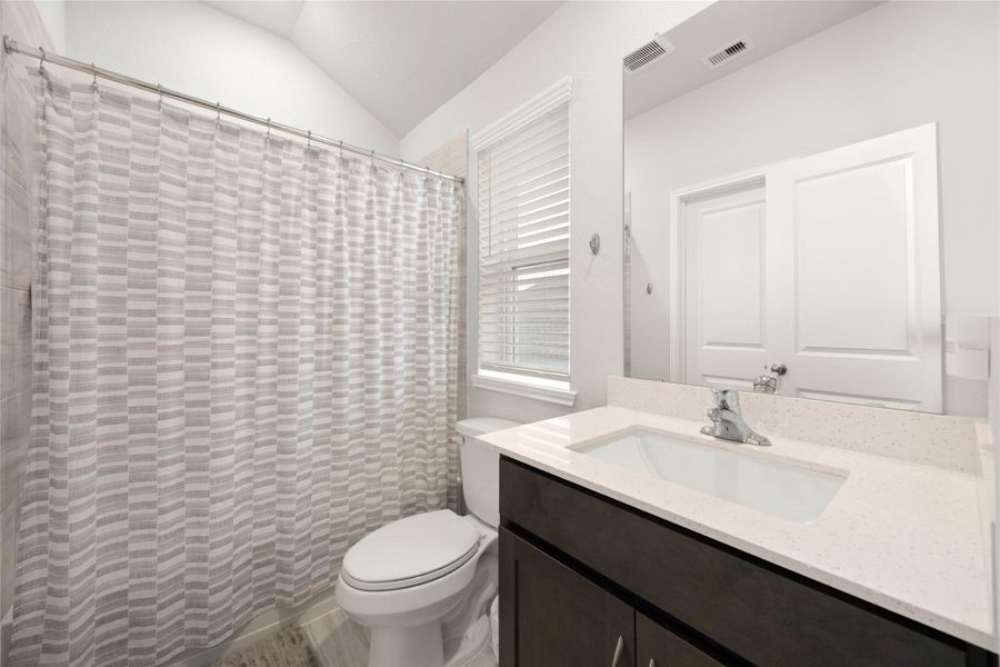 Featuring a tub and shower combination, it is designed for both everyday routines and relaxation. Featuring a tub and shower combination, it is designed for both everyday routines and relaxation.