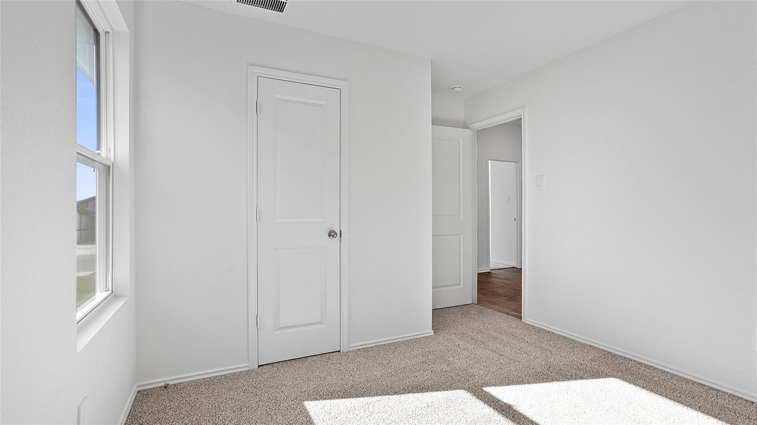 Spacious, unfurnished interior of a new home in Marigold, Kyle (Image 22).