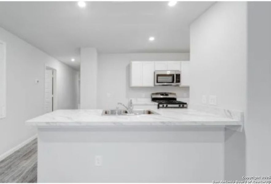 Furnished interior view inside a new home in Las Colinas, Kenedy (Image 4). Furnished interior view inside a new home in Las Colinas, Kenedy (Image 4).
