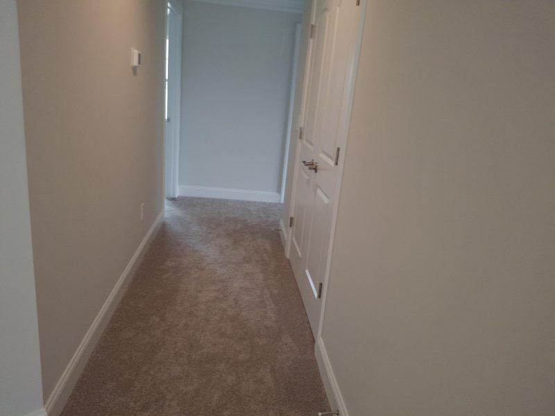 Spacious, unfurnished interior of a new home in Weybridge, Burlington (Image 56).