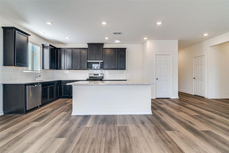 Furnished interior view inside a new home in Heartland Signature, Crandall (Image 5).