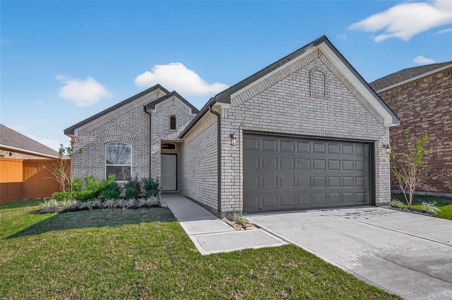 Front exterior of a new home in Lago Mar, Texas City, TX, highlighting curb appeal (Image 22).