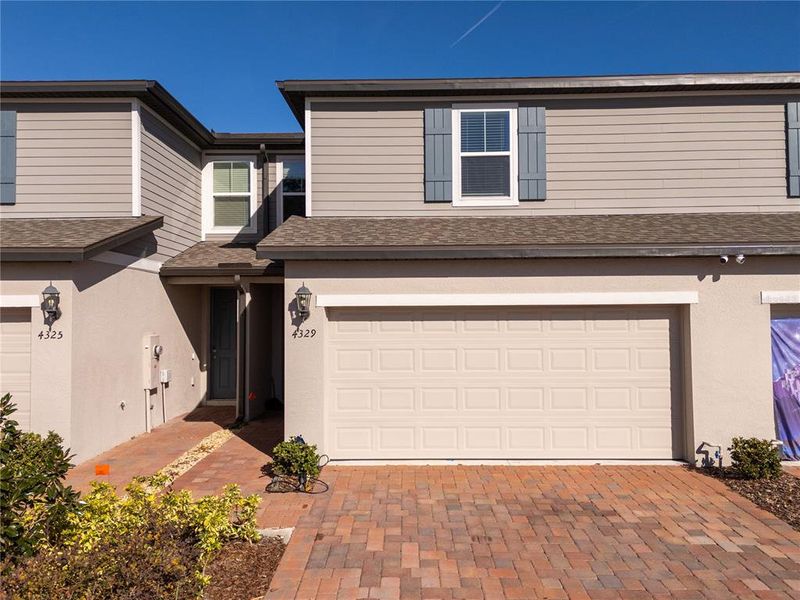 Front exterior of a new home in , St. Cloud, FL, highlighting curb appeal (Image 25). Front exterior of a new home in , St. Cloud, FL, highlighting curb appeal (Image 25).