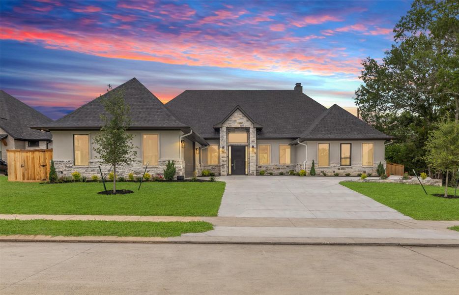 Front exterior of a new home in , College Station, TX, highlighting curb appeal (Image 27).