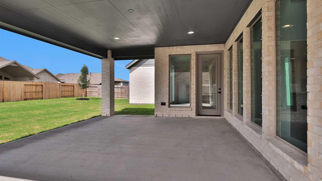 Exterior details and patio area of a home in Valencia, Manvel (Image 2). Exterior details and patio area of a home in Valencia, Manvel (Image 2).