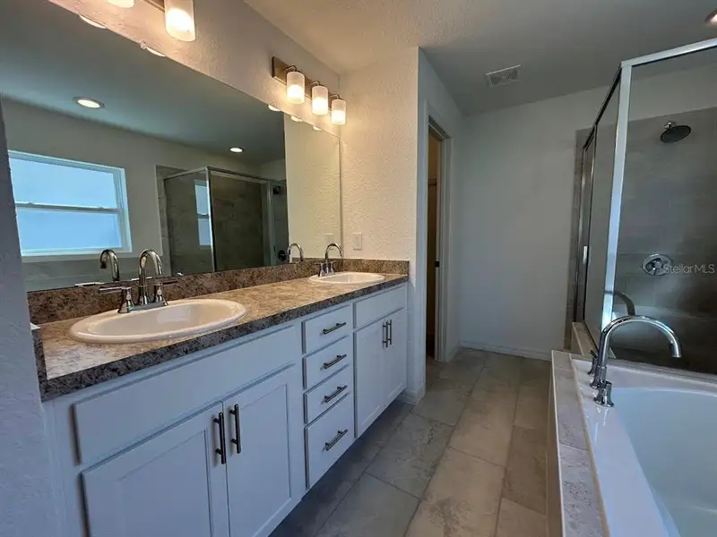 Furnished interior view inside a new home in James Farms, Bartow (Image 2). Furnished interior view inside a new home in James Farms, Bartow (Image 2).