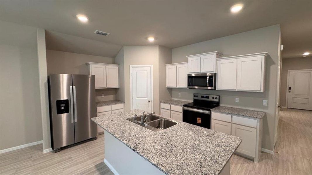 Kitchen - All Home and community information, including pricing, included features, terms, availability and amenities, are subject to change at any time without notice or obligation. All Drawings, pictures, photographs, video, square footages, floor plans, elevations, features, colors and sizes are approximate for illustration purposes only and will vary from the homes as built. Kitchen - All Home and community information, including pricing, included features, terms, availability and amenities, are subject to change at any time without notice or obligation. All Drawings, pictures, photographs, video, square footages, floor plans, elevations, features, colors and sizes are approximate for illustration purposes only and will vary from the homes as built.