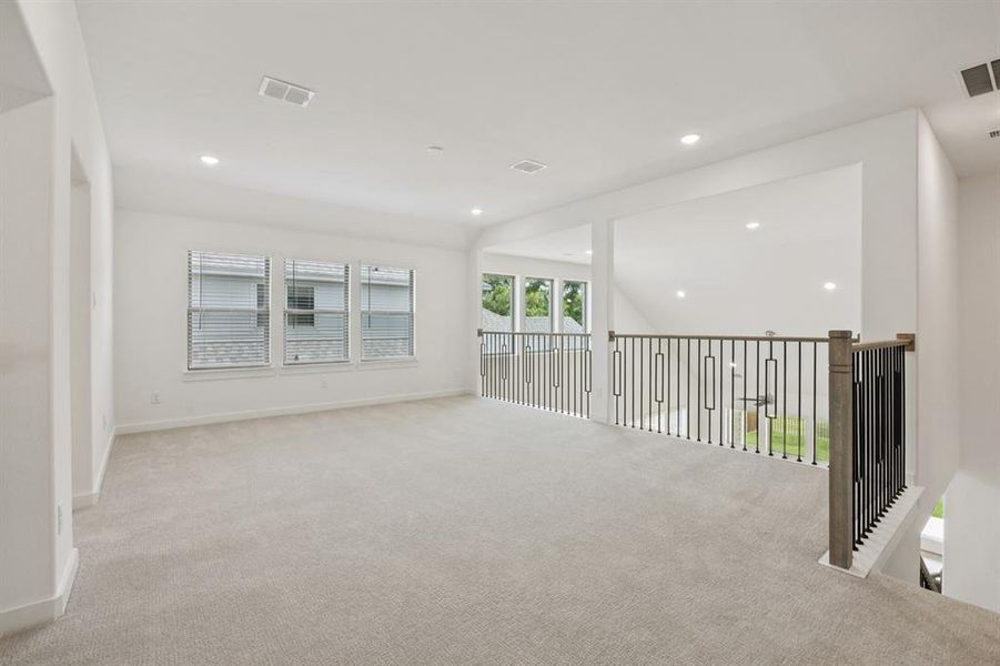 Game Room in the Monet II home plan by Trophy Signature Homes – REPRESENTATIVE PHOTO